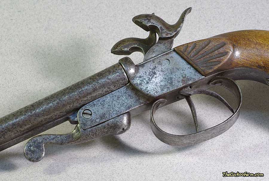 Double Barrel Pinfire Pistol Close up of the trigger group, hammers and barrel lock