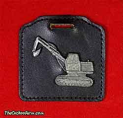 American Poclain Corporation excavator watch fob