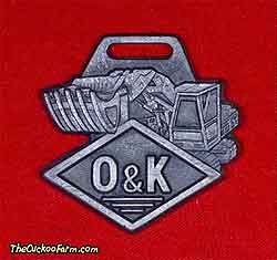 O & K tracked shovel watch fob