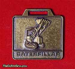 Caterpillar tracker loader watch fob