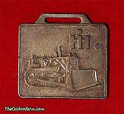 International Harvester tracked dozer - Edward Ehrbar Inc. watch fob