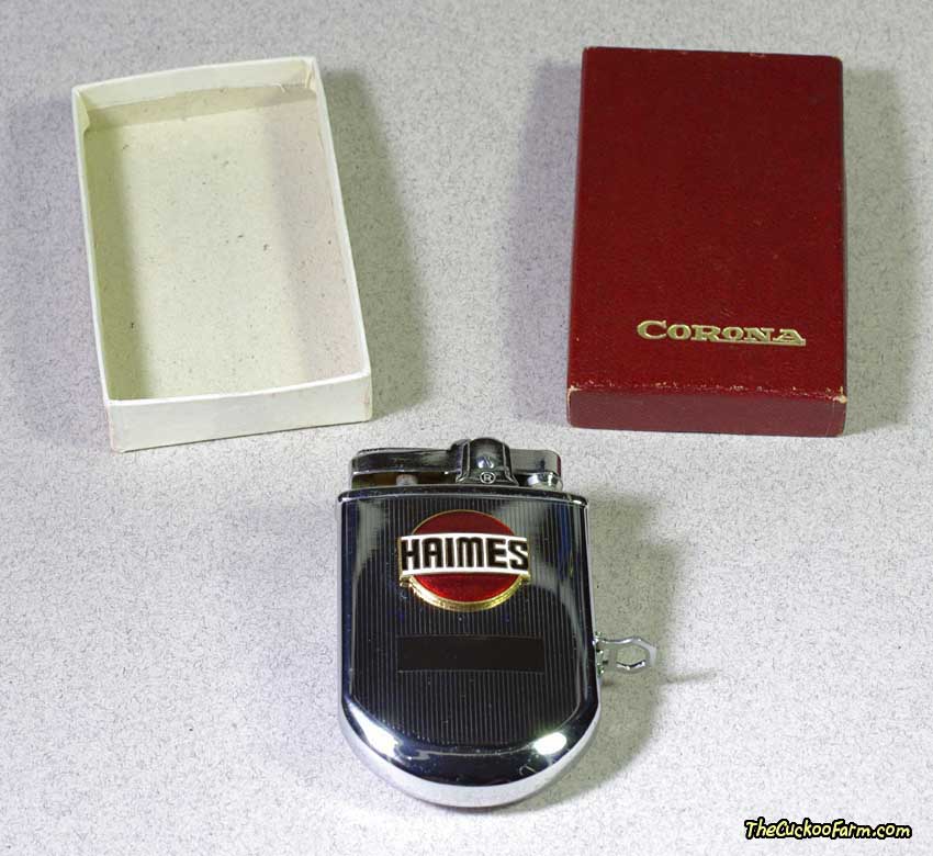 Corona cigarette lighter with Leonard Haimes Co. New York, NY logo, complete