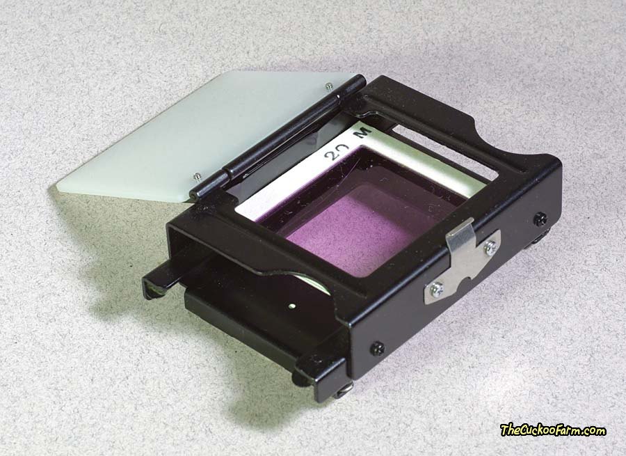 Spiratone 2x2 CP Color Filter mounted in carrier