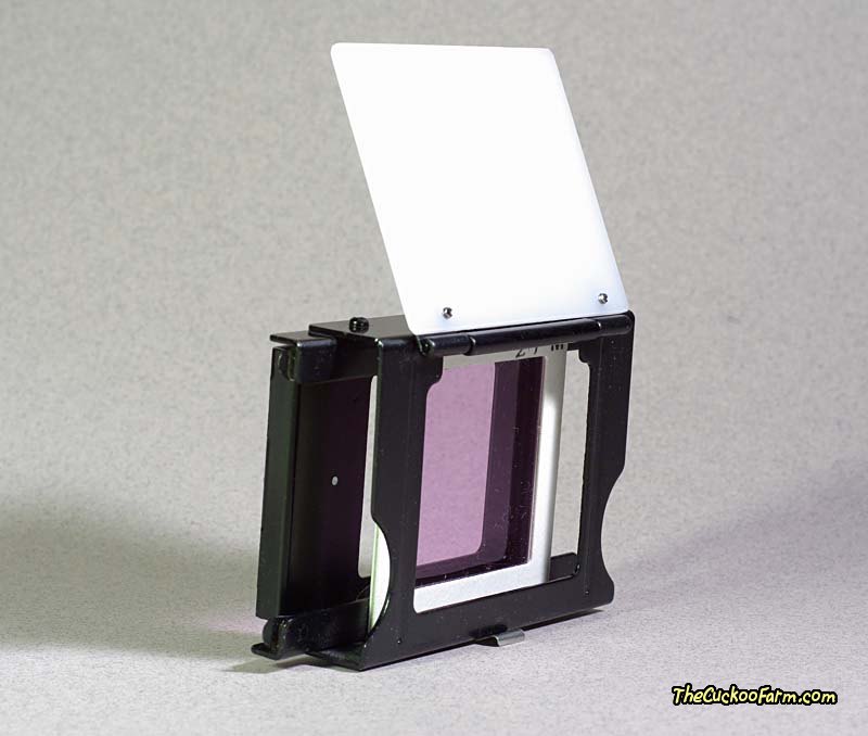 Spiratone 2x2 CP Color Filter mounted in forward slot