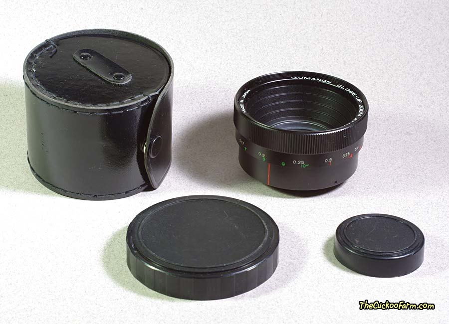 This is the Izumanon close-up Zoom Attachment lens with caps and case
